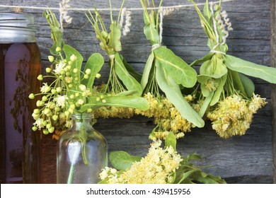 linden flowers, herbal medicine, Cup of healthy linden tea with honey. briar powder in wooden spoon. folk, alternative, complementary medicine, traditional medicine. soft focus image