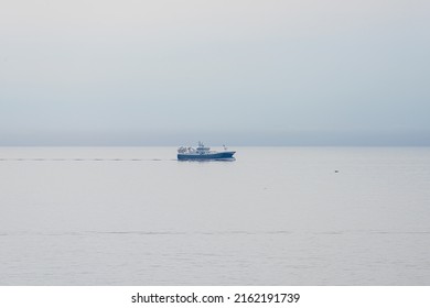 Lindesnes, Norway - April 16 2022: Nearly 90 Meters Long Pelagic Trawler HG 264 Ruth Passing Lindesnes Fyr On Calm Seas.