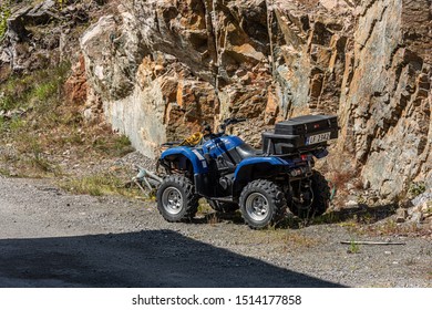 Lindesnes, Norway - July 15 2019: Yamaha Grizzly 660 4x4 ATV By The Side Of A Road.