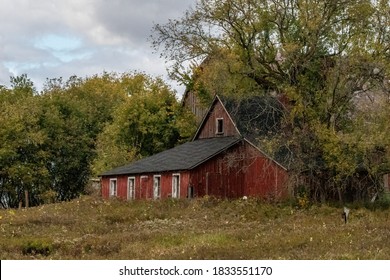 Lindstrom, MN USA September 30, 2020 Closeup Of A Red Barn Surrounded By Trees.