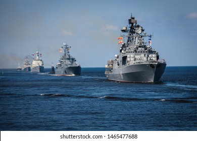 A Line Ahead Of Modern Russian Military Naval Battleships Warships In The Row, Northern Fleet And Baltic Sea Fleet, Summer Sunny Day
