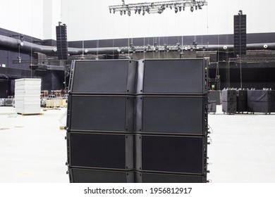 Line array speakers. Stage, trusses, led screen, sound speakers, stage lighting. Professional concert equipment for live show.