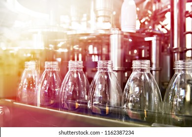 Line Of Bottling Beverages In Plastic Bottles On Factory