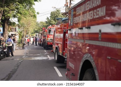 line of fire engines fighting fires. : Yogyakarta, Indonesia - 12 May 2022