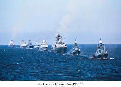 A Line Of Modern Russian Military Naval Battleships Warships In The Row, Northern Fleet And Baltic Sea Fleet In The Open Sea