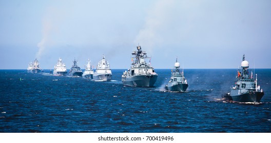 A Line Of Modern Russian Military Naval Battleships Warships In The Row, Northern Fleet And Baltic Sea Fleet In The Open Sea