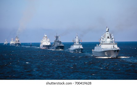 A Line Of Modern Russian Military Naval Battleships Warships In The Row, Northern Fleet And Baltic Sea Fleet In The Open Sea