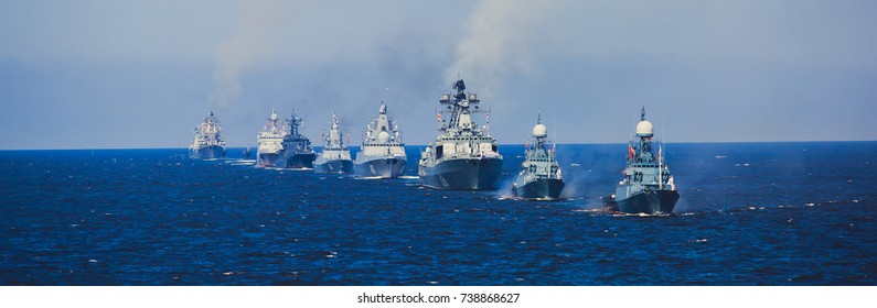 A Line Of Modern Russian Military Naval Battleships Warships In The Row, Northern Fleet And Baltic Sea Fleet In The Open Sea
