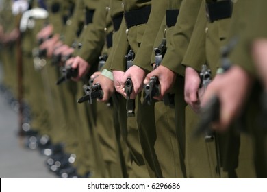 Line Of New Zealand Army Soldiers With Bayonets Fixed, Standing At Ease.