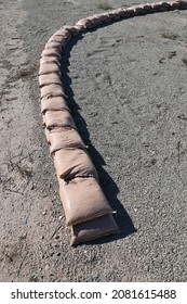 A Line Of Sandbags To Prevent Erosion And Flooding Set Out Before A Storm.