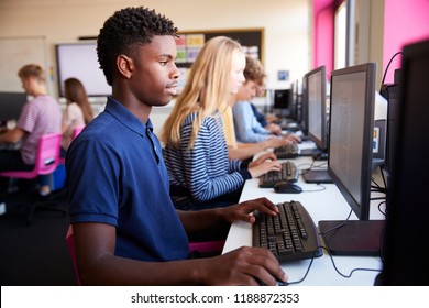 Line Of Teenage High School Students Studying In Computer Class