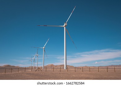 Line of wind turbines in San Pedro de Atacama in Chile. Sustainable and renewable energy source. 