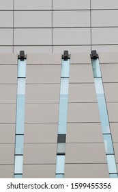 Line and window patterns on the wall of building.