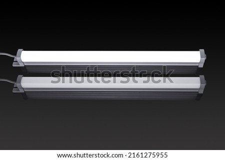Linear led lighting. LED lights, track LED lamp. Office lighting. Composition of linear lamps. New technologies. High power linear SMD white lighting LED isolated on black background