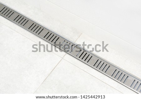 Linear shower drain system. With grate. Drainage at bathroom
