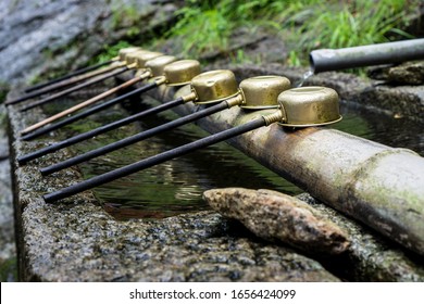 Lined Up Chozuya Ladel To Wash Hands