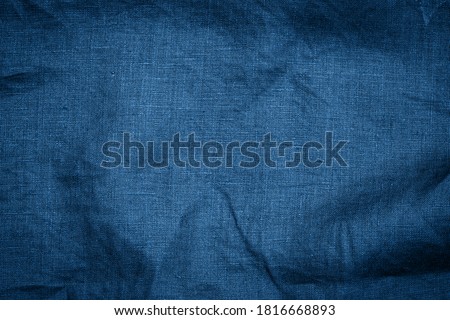 Linen  cloth blue texture background. Linen dark blue fabric. Classic blue colour trend of 2021 year.