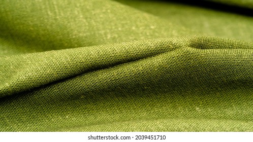 Linen fabric is green. Damask linen is woven on a jacquard loom using a mixture of plain and satin weaves. Fibers are usually flat and double-sided