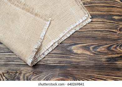 Linen Napkin On Vintage Wooden Kitchen Table. Top View. Flat Lay. 