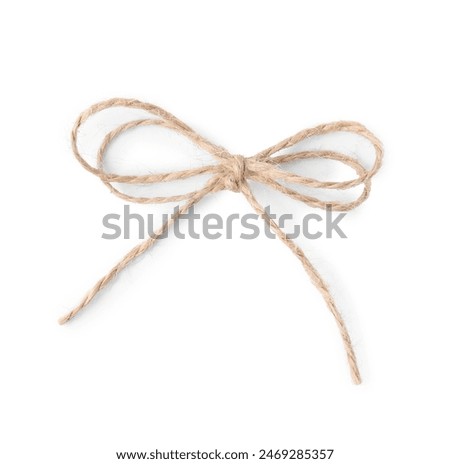 Linen rope string bow isolated on white, top view