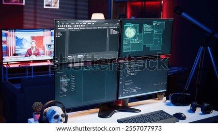 Lines of code displayed on computer monitors used by cybercriminal stealing sensitive information. Virus scripts running on PC infecting network systems, breaking passwords
