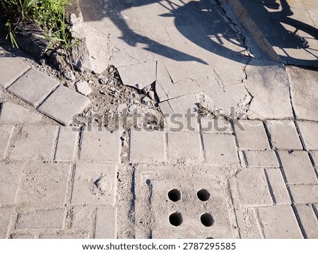 Lines, cracks, and quiet patterns. Just an ordinary pavement, but the geometry holds its own kind of beauty. Finding art in the everyday.