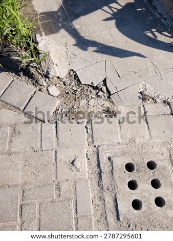 Lines, cracks, and quiet patterns. Just an ordinary pavement, but the geometry holds its own kind of beauty. Finding art in the everyday.