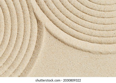 Lines Drawing On Sand, Beautiful Sandy Texture. Spa Background, Concept For Meditation And Relaxation. Concentration And Spirituality In Japanese Zen Garden. View From Above.