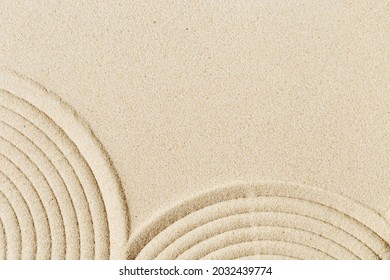 Lines Drawing On Sand, Beautiful Sandy Texture. Spa Background, Concept For Meditation And Relaxation. Concentration And Spirituality In Japanese Zen Garden. View From Above.