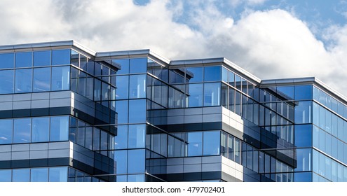 Lines, glass and reflections of modern architecture.  Glass paneled building of new office space in city of Moncton, New Brunswick.  - Shutterstock ID 479702401