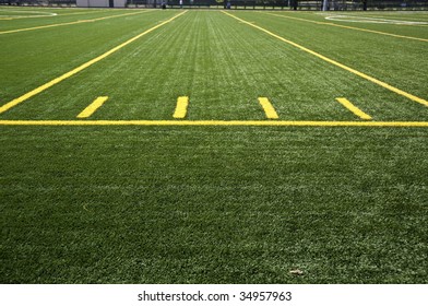 Lines on a field in a stadium.