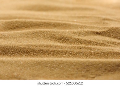 Lines In The Sand Of A Beach. Close Up Texture