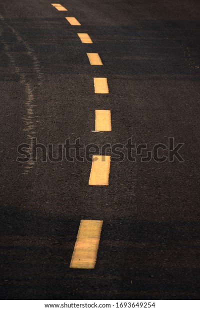 the lines traffic on the road for lane driving\
symbol with safty