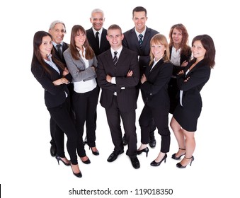 Lineup Of Diverse Professional Business Executives Or Partners Standing Relaxed In A Row Isolated On White