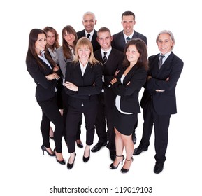 Lineup Of Diverse Professional Business Executives Or Partners Standing Relaxed In A Row Isolated On White