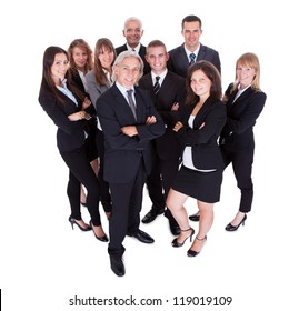 Lineup Of Diverse Professional Business Executives Or Partners Standing Relaxed In A Row Isolated On White