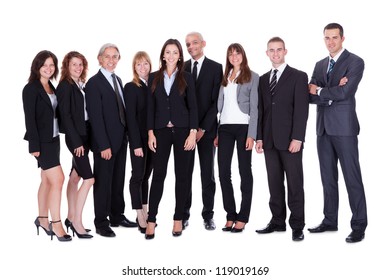 Lineup Of Diverse Professional Business Executives Or Partners Standing Relaxed In A Row Isolated On White