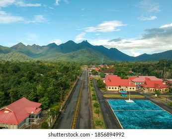 Lingga, Indonesia - November 16, 2020: Signing of the Lingga Government Building; Lingga Government office complex in Kota Daik, Background of mountains. - Shutterstock ID 1856894992