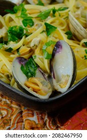 Linguine With Littleneck White Wine Clam Sauce And Parsley Garnish