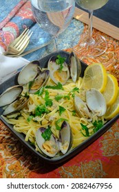 Linguine With Littleneck White Wine Clam Sauce And Parsley Garnish