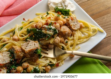 Linguine Pasta With Italian Chicken Sausage Chickpeas And Kale In A Creamy Ricotta Cheese Sauce