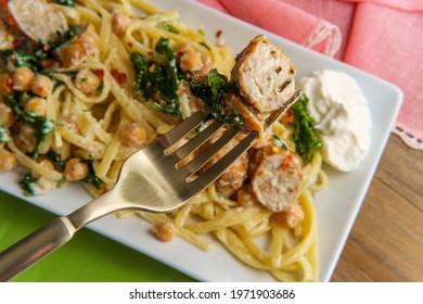 Linguine Pasta With Italian Chicken Sausage Chickpeas And Kale In A Creamy Ricotta Cheese Sauce