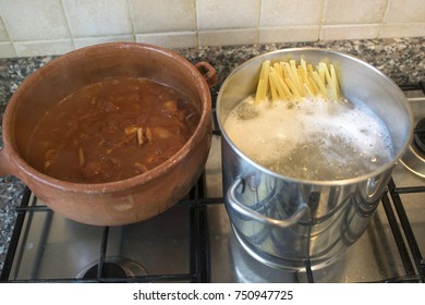 Linguine Pasta With Squids Ragout Cooked In A Terracotta Casserole