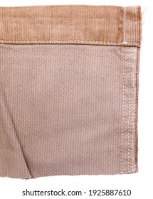 Lining of cotton corduroy retail, showing hem and wrinkles, against white background