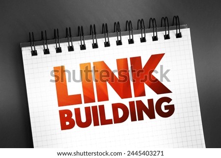 Link building - practice of building one-way hyperlinks to a website with the goal of improving search engine visibility, text concept on notepad