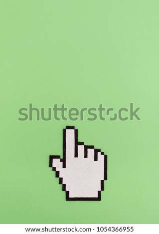 Link click pixel hand cursor symbol on green background with copy space
