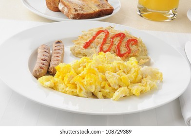 Link Sausage With Eggs And Hash Browns For Breakfast