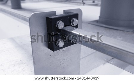 linkage iron guard plate on the manual damper actuation lever.