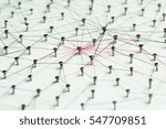 Linking entities, Network simulation, social media, Communications Network, The connection between the two networks. in paper linked together by cotton with a black and red yarn