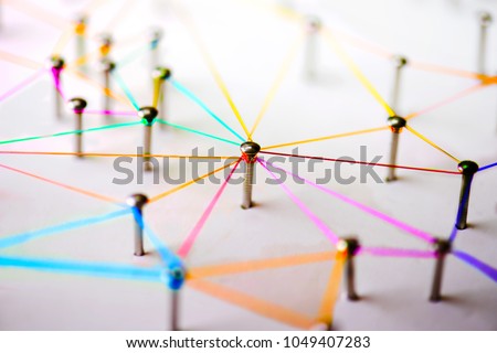 Linking entities. Networking, social media, SNS, internet communication abstract. devices or people connected to a network. Colorful Web of green, blue, red and blue purple wires on white background.
